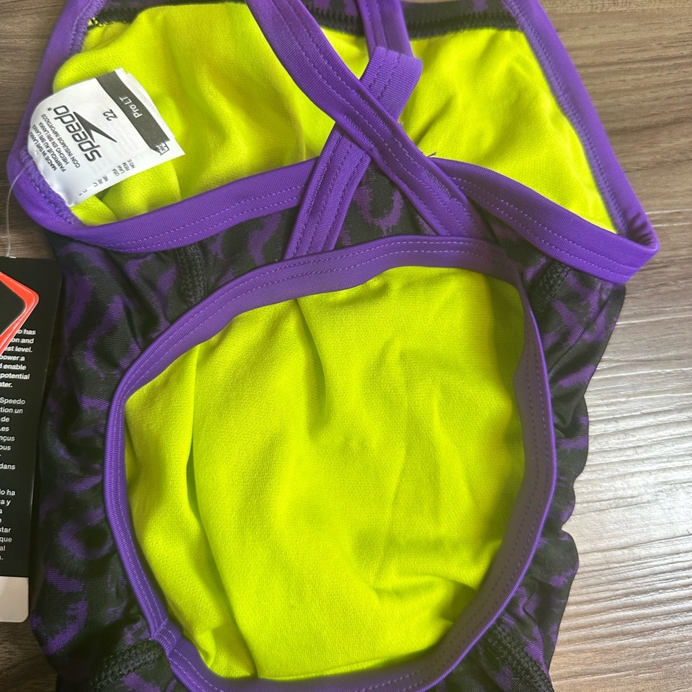 Speedo One Piece Swimsuit Purple Black Print Neon Yellow Lining Size 7/8 NWT - Picture 9 of 10